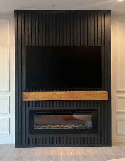 Remodeled media center with fireplace 2 front angle